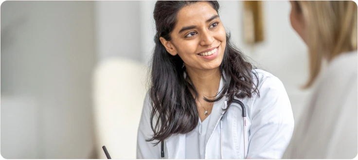 Two female doctors smiling